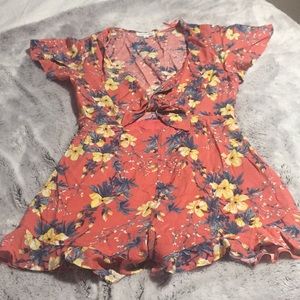 Summer flower coral romper . As new I love it .